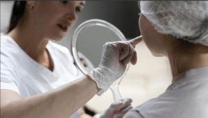 A medical weight loss clinic professional meets with her patient during a consultation and tells her about 5 things to consider before deciding if facials are worth it.