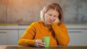 A tired woman adjusting to the medication semaglutide. This fatigue will pass once her body’s energy levels balance.